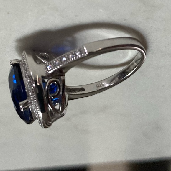 925 Silver Blue CZ Surrounded & edged with Clear CZ stones Scrolled cage Sz 7 - Picture 10 of 14